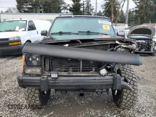 1988 Jeep Grand Cherokee z VIN 1JCMT7895JT247338, wystawiony jako Copart lot #83615234 z przebiegiem 185 676 mil mil oraz Szkoda całkowita • Salvage title. Historia ofert i sprzedaży dostępna na DreamBid. Obrazek 5.