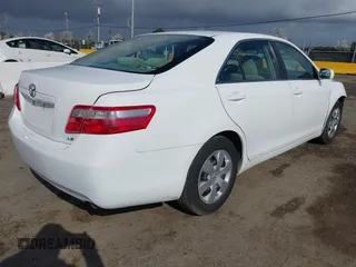 2009 Toyota Camry with VIN 4T1BE46K69U913065, listed as a IAAI auction lot 41906304 with 153,018 mi miles. Bid and sale history available at carsss.com. Image 4.