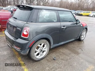 2011 MINI Hardtop S with VIN WMWSV3C57BTY11344, listed as a IAAI auction lot 41728349 with 84,242 mi miles and . Bid and sale history available at DreamBid. Image 4.