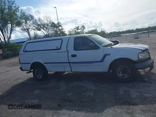 2004 Ford F-150 XL с VIN 2FTRF17W84CA14975, выставлен на аукционе IAAI как лот 42392138 с пробегом 121 799 миль миль и . История ставок и продаж доступна на DreamBid. Изображение 13.