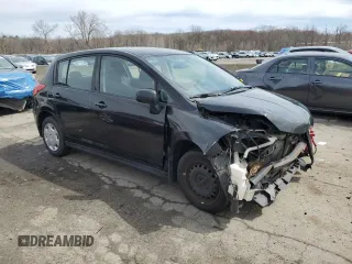 2009 Nissan Versa S with VIN 3N1BC13E49L363630, listed as a Copart auction lot 53118515 with 135,573 mi miles and Salvage Title. Bid and sale history available at DreamBid. Image 4.