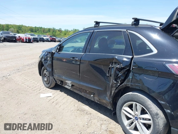 2018 Ford Edge SEL with VIN 2FMPK4J8XJBC16521, listed as a IAAI auction lot 42154715 with 126,761 mi miles and . Bid and sale history available at DreamBid. Image 6.