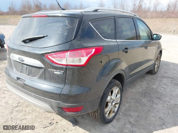 2014 Ford Escape Titanium with VIN 1FMCU9JXXEUE45634, listed as a IAAI auction lot 41840303 with 109,692 mi miles. Bid and sale history available at carsss.com. Image 4.