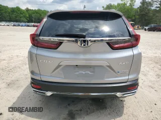 2020 Honda CR-V Touring z VIN 7FART6H94LE013557, wystawiony jako Copart lot #54605755 z przebiegiem 42 554 mil mil oraz Szkoda całkowita • Salvage title. Historia ofert i sprzedaży dostępna na DreamBid. Obrazek 6.