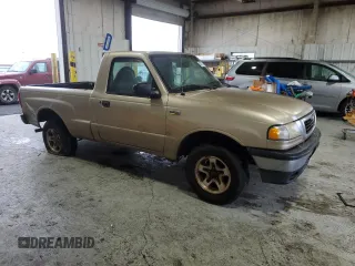 2000 Mazda B-Series 2WD Truck SX with VIN 4F4YR12C1YTM19515, listed as a Copart auction lot 82472574 with 357,701 mi miles and Clean Title. Bid and sale history available at carsss.com. Image 4.