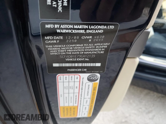 2009 Aston Martin DB9 z VIN SCFAD01E79GA12139, wystawiony jako Copart lot #76241164 z przebiegiem Nie podano mil oraz Szkody całkowita. Historia ofert i sprzedaży dostępna na DreamBid. Obrazek 13.