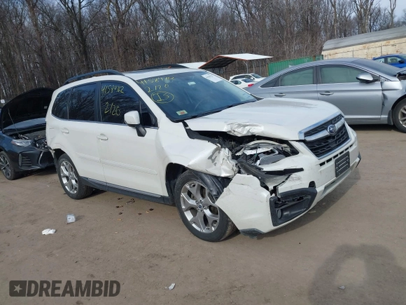 2018 Subaru Forester Touring z VIN JF2SJAWC0JH435392, wystawiony jako IAAI lot #41584762 z przebiegiem 92 151 mil mil oraz . Historia ofert i sprzedaży dostępna na DreamBid. Obrazek 1.