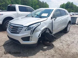 2018 Cadillac XT5 FWD with VIN 1GYKNARS4JZ142654, listed as a IAAI auction lot 42275794 with 112,790 mi miles and . Bid and sale history available at DreamBid. Image 2.