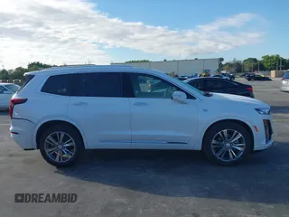 2025 Cadillac XT6 FWD Premium Luxury with VIN 1GYKPCRS9SZ122102, listed as a IAAI auction lot 41677275 with 4,227 mi miles. Bid and sale history available at carsss.com. Image 13.