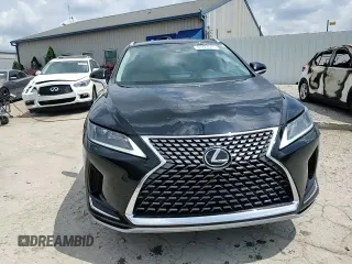 2020 Lexus RX 350 с VIN 2T2HZMDAXLC225454, выставлен на аукционе Copart как лот 61424305 с пробегом 97 348 миль миль и Списание • Salvage title. История ставок и продаж доступна на DreamBid. Изображение 14.