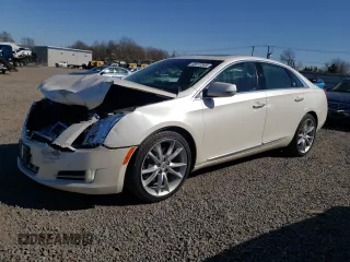 2013 Cadillac XTS Premium z VIN 2G61S5S34D9201773, wystawiony jako Copart lot #48572365 z przebiegiem 78 296 mil mil oraz Szkody całkowita. Historia ofert i sprzedaży dostępna na DreamBid. Obrazek 1.