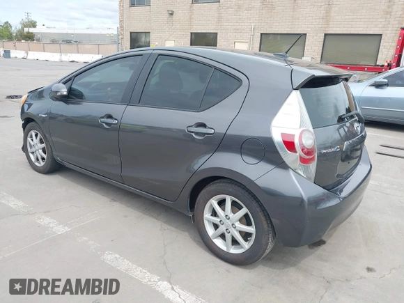 2013 Toyota Prius One with VIN JTDKDTB34D1047568, listed as a IAAI auction lot 41950373 with 99,319 mi miles and . Bid and sale history available at carsss.com. Image 3.