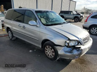 2005 Kia Sedona LX with VIN KNDUP132356769452, listed as a Copart auction lot 82835494 with 93,845 mi miles and Salvage Title. Bid and sale history available at carsss.com. Image 4.