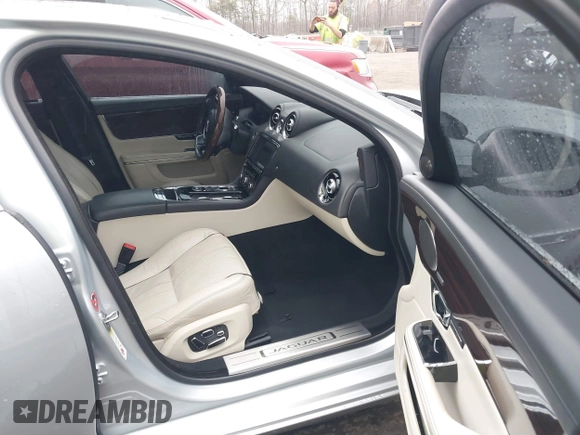 2015 Jaguar XJ with VIN SAJWA2GZ8F8V83551, listed as a IAAI auction lot 41909403 with 112,098 mi miles. Bid and sale history available at carsss.com. Image 5.