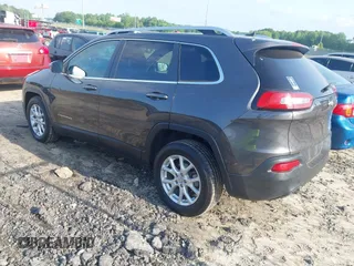 2014 Jeep Cherokee Latitude with VIN 1C4PJLCB6EW241897, listed as a IAAI auction lot 42128880 with 126,242 mi miles. Bid and sale history available at carsss.com. Image 3.