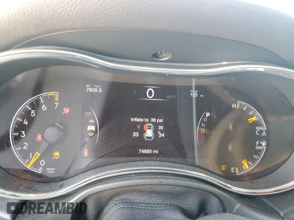 2022 Jeep Grand Cherokee Laredo X with VIN 1C4RJEAG1NC155952, listed as a Copart auction lot 52170235 with 74,695 mi miles and Salvage title. Bid and sale history available at DreamBid. Image 9.