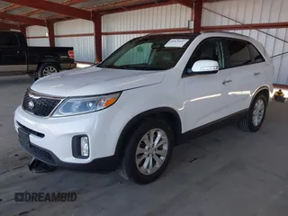 2015 Kia Sorento EX with VIN 5XYKU4A74FG577696, listed as a IAAI auction lot 41870637 with 129,400 mi miles. Bid and sale history available at carsss.com. Image 2.
