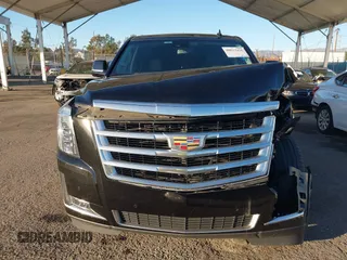 2020 Cadillac Escalade ESV Luxury z VIN 1GYS4HKJ3LR181834, wystawiony jako IAAI lot #40813416 z przebiegiem 65 857 mil mil oraz . Historia ofert i sprzedaży dostępna na DreamBid. Obrazek 13.