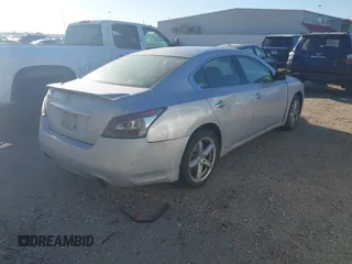2013 Nissan Maxima SV with VIN 1N4AA5AP4DC807870, listed as a IAAI auction lot 41809194 with 129,034 mi miles and . Bid and sale history available at DreamBid. Image 4.