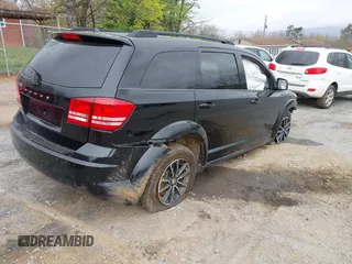 2018 Dodge Journey SE with VIN 3C4PDCAB8JT448530, listed as a IAAI auction lot 41942261 with 86,055 mi miles and . Bid and sale history available at carsss.com. Image 4.