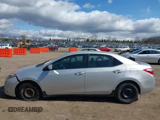 2016 Toyota Corolla L z VIN 5YFBURHE1GP394996, wystawiony jako IAAI lot #41971802 z przebiegiem 189 033 mil mil oraz . Historia ofert i sprzedaży dostępna na DreamBid. Obrazek 14.