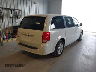 2017 Dodge Grand Caravan SE with VIN 2C4RDGBG4HR736309, listed as a IAAI auction lot 41993938 with 105,213 mi miles and . Bid and sale history available at DreamBid. Image 4.