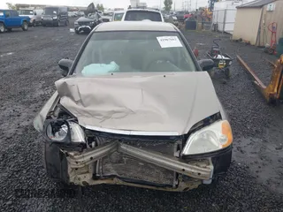 2003 Honda Civic LX with VIN 2HGES16553H620059, listed as a IAAI auction lot 41967662 with 119,918 mi miles and . Bid and sale history available at carsss.com. Image 13.
