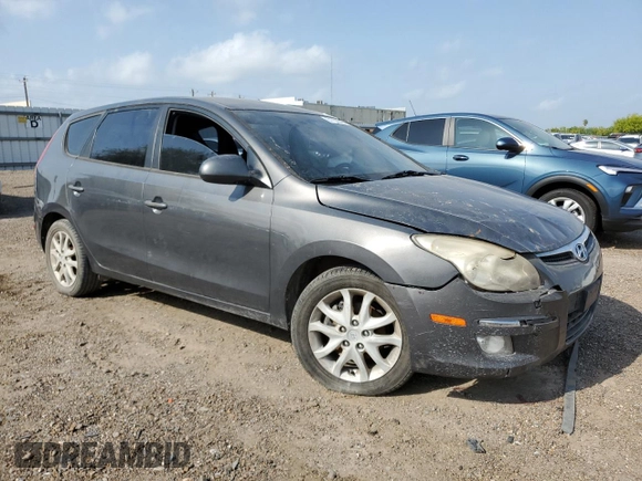 2009 Hyundai Elantra Touring with VIN KMHDC86E29U043685, listed as a Copart auction lot 51700545 with 208,298 mi miles and Salvage title. Bid and sale history available at DreamBid. Image 4.