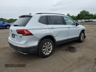 2018 Volkswagen Tiguan SEL with VIN 3VV2B7AX3JM185619, listed as a Copart auction lot 59421195 with 164,431 mi miles and Salvage title. Bid and sale history available at DreamBid. Image 3.