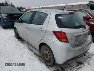 2015 Toyota Yaris L with VIN VNKKTUD30FA018469, listed as a Copart auction lot 47103985 with 126,060 mi miles and Salvage Title. Bid and sale history available at DreamBid. Image 2.