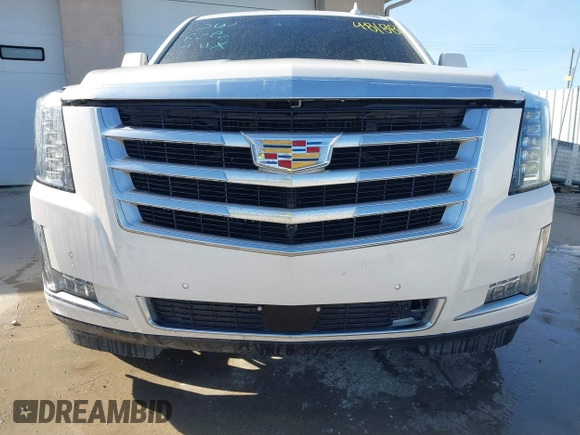 2015 Cadillac Escalade ESV Premium z VIN 1GYS4TKJ9FR700022, wystawiony jako IAAI lot #41748188 z przebiegiem 166 416 mil mil oraz . Historia ofert i sprzedaży dostępna na DreamBid. Obrazek 6.