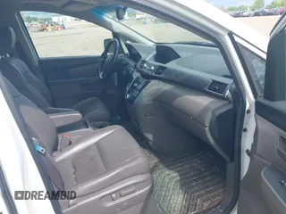 2012 Honda Odyssey EX-L with VIN 5FNRL5H63CB117341, listed as a IAAI auction lot 42197815 with 256,544 mi miles and . Bid and sale history available at DreamBid. Image 5.