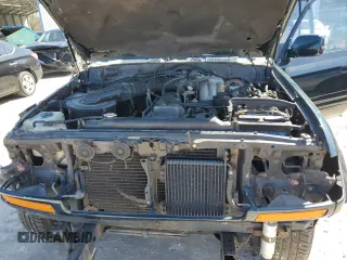 1995 Toyota Land Cruiser z VIN JT3DJ81W6S0106332, wystawiony jako Copart lot #47772055 z przebiegiem 214 499 mil mil oraz Szkoda całkowita • Salvage title. Historia ofert i sprzedaży dostępna na DreamBid. Obrazek 12.