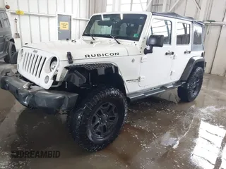 2016 Jeep Wrangler Unlimited Rubicon with VIN 1C4HJWFG4GL127379, listed as a IAAI auction lot 41732688 with 110,193 mi miles. Bid and sale history available at carsss.com. Image 2.