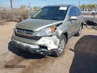 2009 Honda CR-V EX-L with VIN JHLRE48749C021353, listed as a IAAI auction lot 42140402 with 190,923 mi miles and . Bid and sale history available at carsss.com. Image 6.