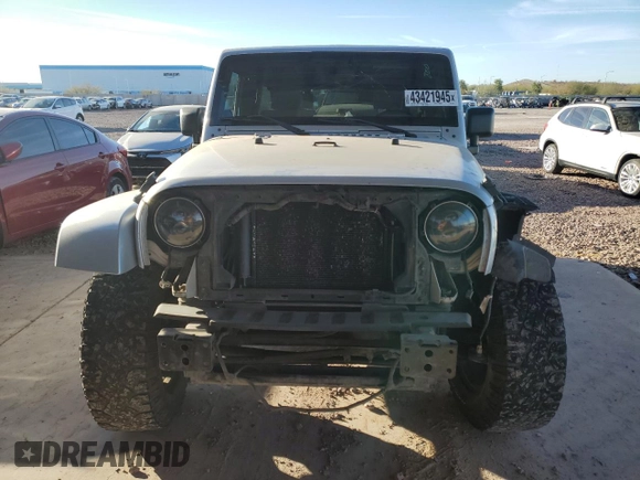 2010 Jeep Wrangler Unlimited Sahara with VIN 1J4HA5H13AL184449, listed as a Copart auction lot 43421945 with 176,725 mi miles and Salvage Title. Bid and sale history available at carsss.com. Image 5.
