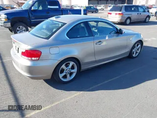 2011 BMW 1 Series 128i with VIN WBAUP7C53BVP21588, listed as a IAAI auction lot 41484300 with 52,124 mi miles. Bid and sale history available at carsss.com. Image 4.