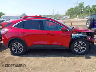 2020 Ford Escape SEL z VIN 1FMCU0H6XLUB62303, wystawiony jako IAAI lot #42646790 z przebiegiem 70 895 mil mil oraz . Historia ofert i sprzedaży dostępna na DreamBid. Obrazek 14.