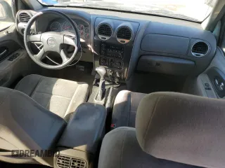 2005 GMC Envoy SLE z VIN 1GKDT13SX52364812, wystawiony jako Copart lot #46224955 z przebiegiem 183 441 mil mil oraz Szkoda całkowita • Salvage title. Historia ofert i sprzedaży dostępna na DreamBid. Obrazek 8.