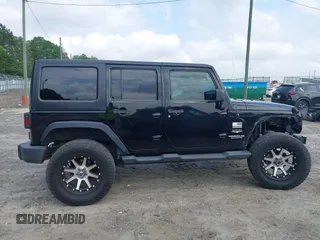 2012 Jeep Wrangler Unlimited Sahara with VIN 1C4HJWEG0CL168300, listed as a IAAI auction lot 42430678 with 70,000 mi miles and . Bid and sale history available at DreamBid. Image 14.