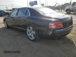 2015 Bentley Flying Spur with VIN SCBEC9ZA1FC049618, listed as a Copart auction lot 83489764 with 85,979 mi miles and Salvage title. Bid and sale history available at DreamBid. Image 2.