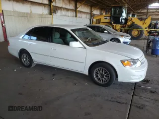2001 Toyota Avalon XL with VIN 4T1BF28B71U123194, listed as a Copart auction lot 84050604 with 199,807 mi miles and Salvage Title. Bid and sale history available at DreamBid. Image 4.