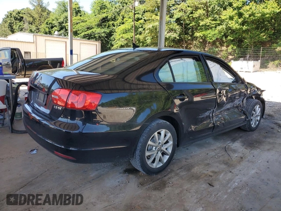 2012 Volkswagen Jetta SE with VIN 3VWDX7AJ2CM340682, listed as a Copart auction lot 57864945 with 180,680 mi miles and Salvage title. Bid and sale history available at DreamBid. Image 3.