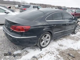 2015 Volkswagen CC Sport with VIN WVWBN7AN6FE819703, listed as a IAAI auction lot 41638624 with 103,785 mi miles and . Bid and sale history available at DreamBid. Image 4.