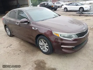 2016 Kia Optima LX with VIN 5XXGT4L30GG075759, listed as a IAAI auction lot 42024856 with 113,740 mi miles. Bid and sale history available at carsss.com. Image 1.