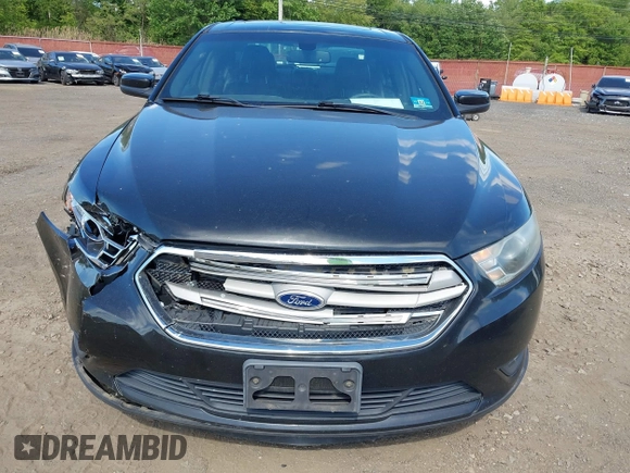 2015 Ford Taurus SEL with VIN 1FAHP2E88FG181055, listed as a IAAI auction lot 42307640 with 104,702 mi miles and . Bid and sale history available at DreamBid. Image 11.
