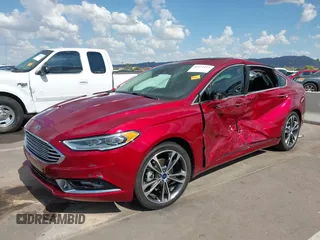 2017 Ford Fusion Titanium with VIN 3FA6P0K98HR207447, listed as a IAAI auction lot 42422213 with 59,549 mi miles and . Bid and sale history available at DreamBid. Image 6.
