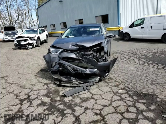 2018 Toyota RAV4 XLE with VIN 2T3RFREV2JW791353, listed as a Copart auction lot 51588515 with 126,830 mi miles and Salvage Title. Bid and sale history available at DreamBid. Image 12.