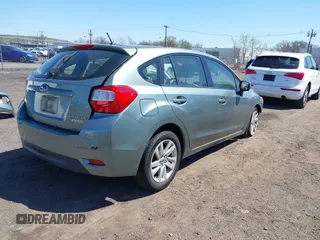 2015 Subaru Impreza Premium z VIN JF1GPAC64FH212027, wystawiony jako IAAI lot #41995629 z przebiegiem 161 006 mil mil oraz . Historia ofert i sprzedaży dostępna na DreamBid. Obrazek 4.