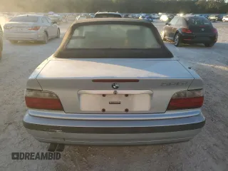1998 BMW 3 Series z VIN WBABK8330WEY89818, wystawiony jako Copart lot #41557015 z przebiegiem 253 522 mil mil oraz Nie do naprawy • Non repairable. Historia ofert i sprzedaży dostępna na DreamBid. Obrazek 6.